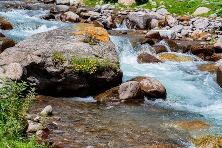Beautiful peaceful view of water in mountain river. Slow shutter speedの写真素材