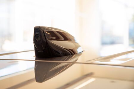Close up modern car antenna with camera