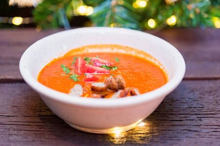 Plate with freshly cooked tomato soup with sausageの写真素材