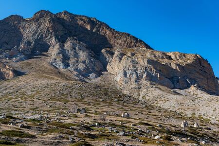 Distant view of medieval tombs in City of Dead near Eltyulbyu, Russia in autumnの写真素材