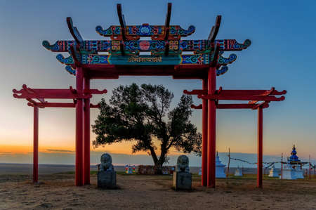 Pagoda for meditation or gazebo in Buddhist style with lonely poplarの写真素材