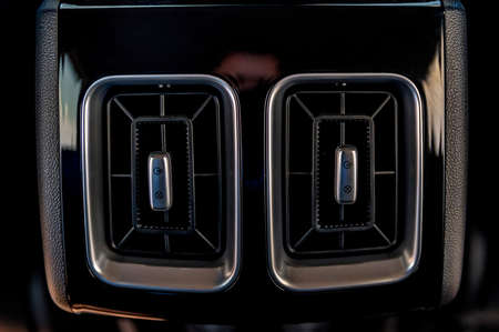Air conditioner in a modern car close up