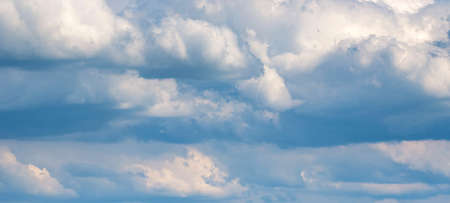 Panoramic blue sky with white clouds on background