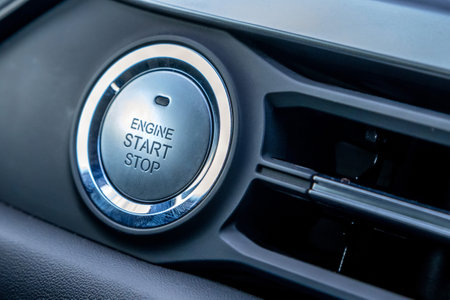 Engine start stop button in modern car close