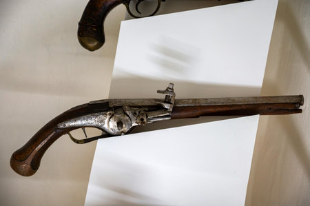 Exhibit of Old Flintlock Pistol, close-up photo.の写真素材