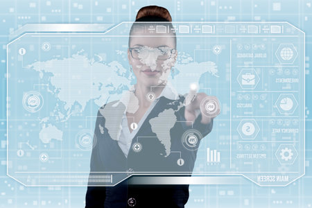 Young business lady in futuristic office with HUD. Global corporate conceptの写真素材