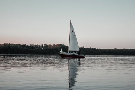 A sailing boat through the lake in Kaunas