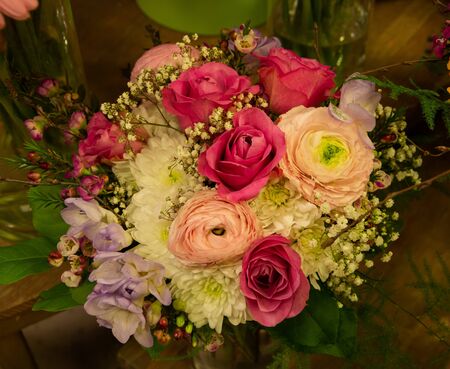 Flower shop prepared flower bloom, florist work wirth ranunculus, creamの写真素材
