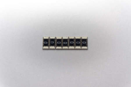 Abstract macro close-up of SMT surface mount chip resistors smart power electronics components...
