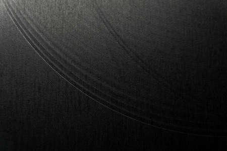 Closeup industrial realistic gray color stainless steel flat part partial focus after industrial CNC routing processing high contrast abstract light reflections narrow high detail linesの写真素材