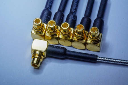 Close-up of gold plated MMCX radio network communications pigtail electronics componentの写真素材