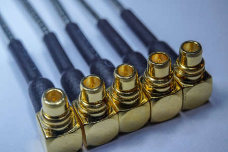 Close-up of gold plated MMCX radio network communications pigtail electronics componentの写真素材