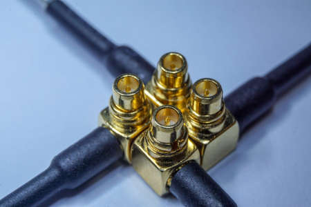 Close-up of gold plated MMCX radio network communications pigtail electronics componentの写真素材