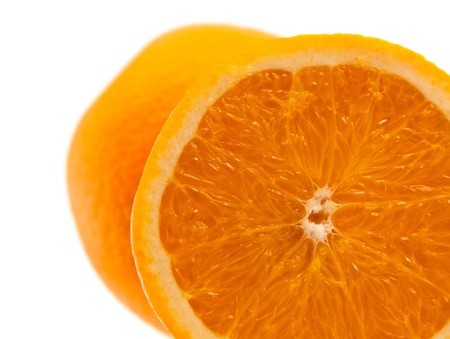 One half of orange isolated on whiteの写真素材