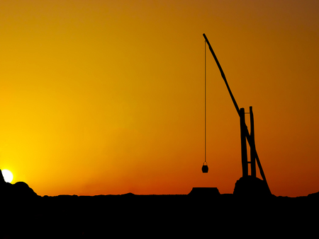 silhouette old water well