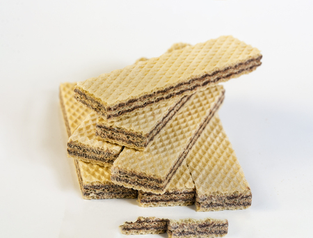 cocoa and hazelnut waffers on a whiteの写真素材