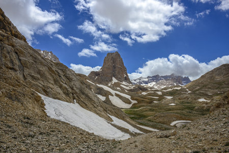 Snowy and cloudy mountain landscapes. Glacier mountain Aladaglar National Park Nigde, Turkey.の写真素材