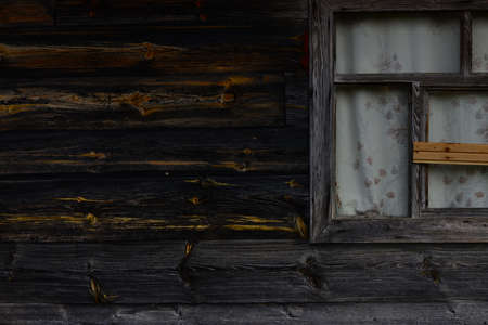 Wooden highland house windowの写真素材