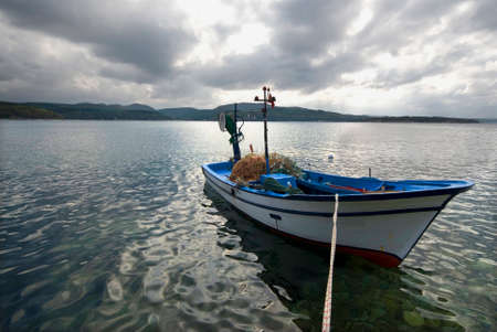 Fishing boat on the seashore. Izmit, Turkey.の写真素材
