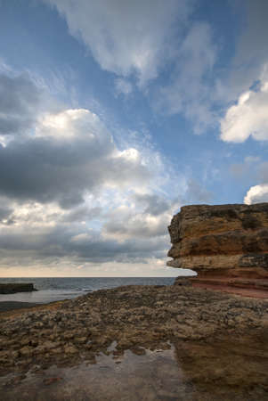 Kerpe Rocks and Pink Rocks. Amazing sunset view on the beach made up of different rock shapes. Colorful fine art image. Giant rocks on the beach. Kerpe, Kocaeli Izmit, Turkey.の写真素材