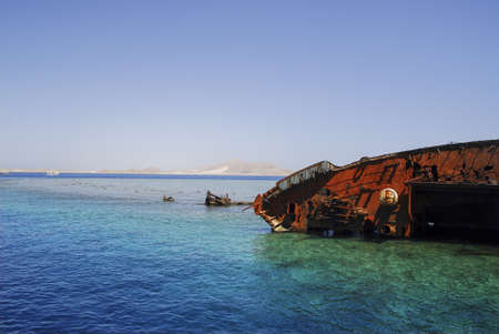 Boat wreck. The remains of the Loullia on the northern edge of Gordon Reef in the Straits of Tiran near Sharm el Sheikh, Egypt.の写真素材