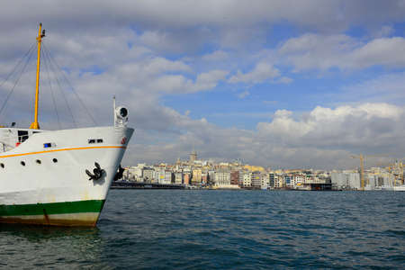Passenger Ferry (Vapur) and fishing boats in EminÃ¶nÃ¼ Station , Kadikoy Istanbul, Turkey