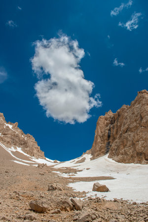 Aladaglar National Park (glacial landscape). Cloudy mountain landscape. Reflections in the lake. Trekking walks. Flowery mountain landscape.Trans transitions. Nigde, Turkey.の写真素材