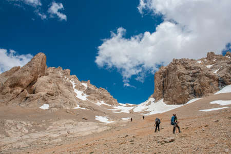 Aladaglar National Park (glacial landscape). Cloudy mountain landscape. Reflections in the lake. Trekking walks. Flowery mountain landscape.Trans transitions. Nigde, Turkey.の写真素材