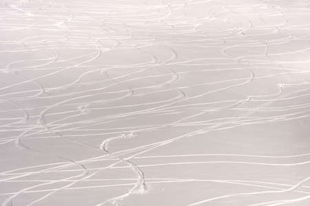 snow floor, snow texture, snowy peaks in cold sunny weather, cloudy snow landscape. Windblown snow texture. Uludag, National Park, Bursa Turkey.の写真素材