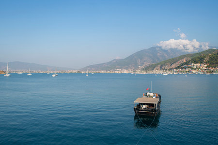 Fethiye is the most beautiful holiday region of Turkey. Fethiye bays. Boats moored in the bays.の写真素材