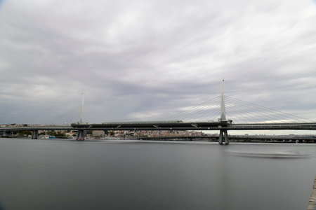 long exposure. View of HaliÃ§ Metro Bridge connecting AzapkapÄ± (BeyoÄlu) and UnkapanÄ± (Fatih) (Halic Metro Bridge). blue sky Istanbul Turkeyの写真素材