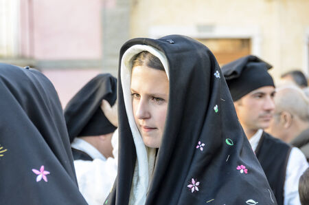 The statue of Ephisius is carried in procession from Cagliari to Nora  Detail of the procession in...