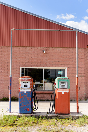 Vintage fuel pump at closed petrol station, USAのeditorial素材