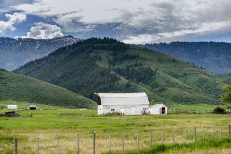 Old white farmhouse in the us along the way, Wyomingの写真素材