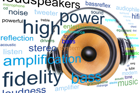 Loudspeaker word cloud concept with yellow woofer and headphones, related tags.の写真素材