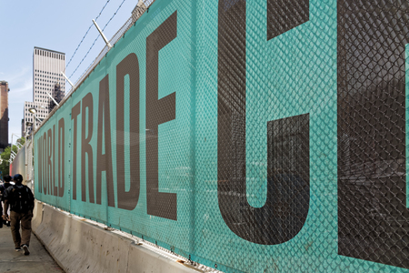 New York, USA - June 08, 2015: Ground Zero with fence for works with the inscription World trade Center. Lower Manhattan.のeditorial素材