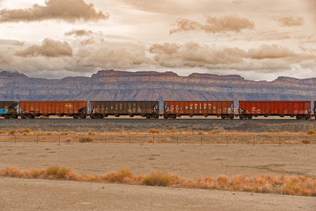 Moab, Utah, USA - June 6, 2015: Rusted cars stationed on the tracks. The Union Pacific Railroad is an American freight railroad company headquartered in Omaha, NE.のeditorial素材