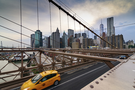 New York City, USA - June 08, 2015: Traffic including a New York Taxi crosses the bridge from Downtown Manhattan in the background toward Brooklyn.のeditorial素材