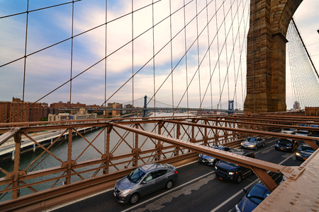 New York City, USA - June 08, 2015: Traffic including a New York Taxi crosses the bridge from Downtown Manhattan in the background toward Brooklyn.のeditorial素材