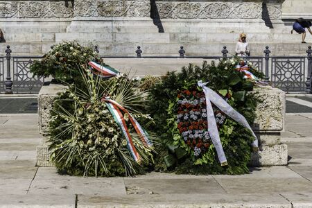 Budapest, Hungary - July 04, 2019: Heroes Square with Millenium Memorial. Particular crown of flowers for the fallen in the square of the heroes.のeditorial素材