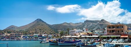 Elounda, Greece, Crete - 05/24/2015: Ships and fishing boats in the harbor of Elounda.のeditorial素材