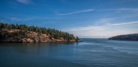 island on blue waterの写真素材