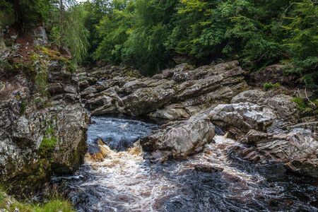 Findhorn river flowing through Highlandsの写真素材