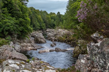 Findhorn river flowing through Highlandsの写真素材