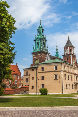 fortified architectural complex with Wawel cathedral on a sunny day with blue skyのeditorial素材