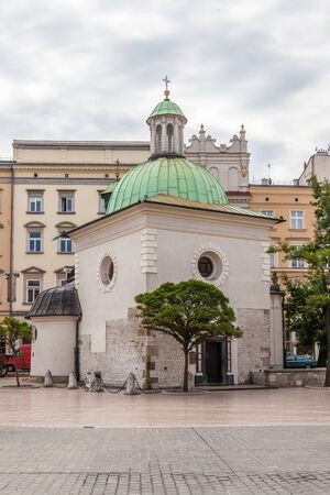 St Wojciech Church in Krakow on a sunny day with blue skyのeditorial素材