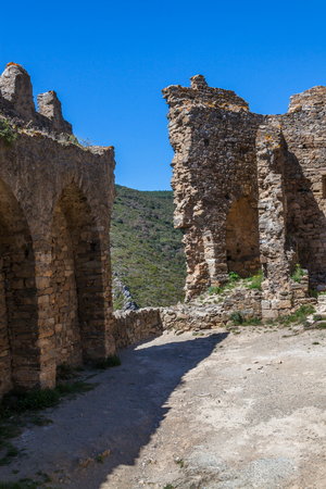 a stone wall of ruins of Lastrous castleの写真素材