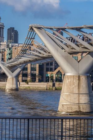 millenium bridge in london on a sunny day and Thames riverの写真素材