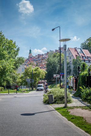 a view of old town in Warsaw Poland from a street on a sunny summer dayの写真素材