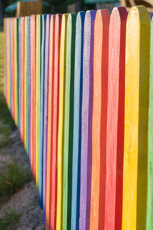 Bright, multi colorful fence on children's playgroundの写真素材